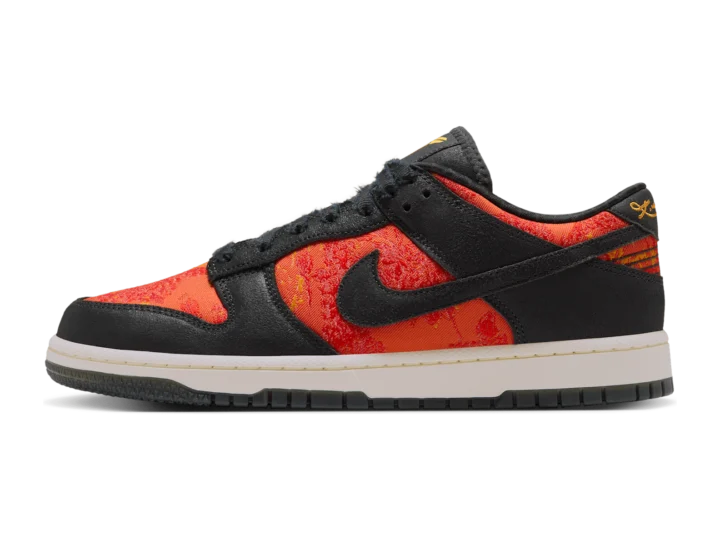 Nike Kobe Dunk Low Protro Anthracite and Sundial, lateral side, orange floral jacquard panels under black worn leather overlays, aged off-white midsole