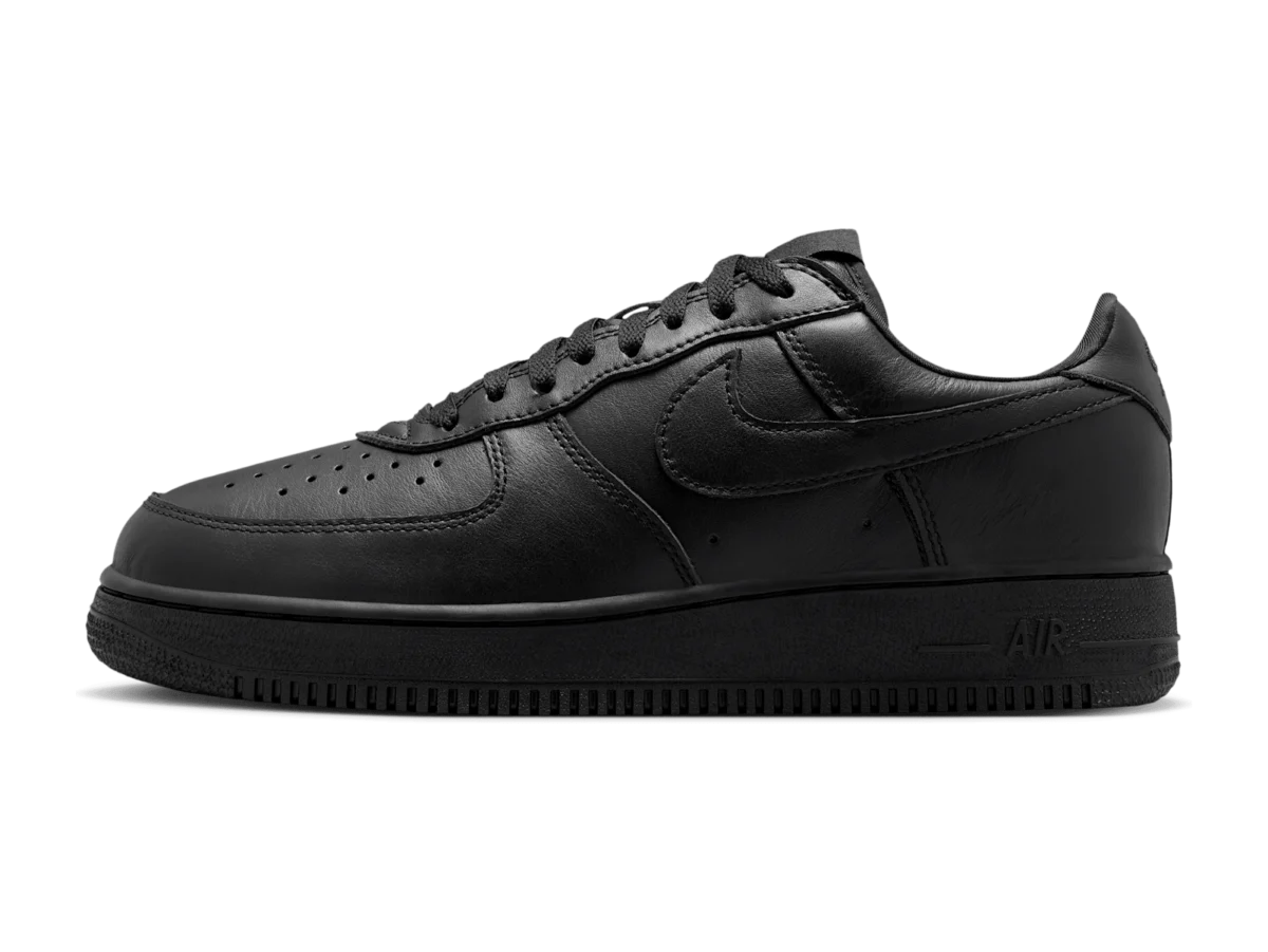 Nike Air Force 1 '01 Black, lateral side, black leather upper with perforated toe, tonal Swoosh and black midsole