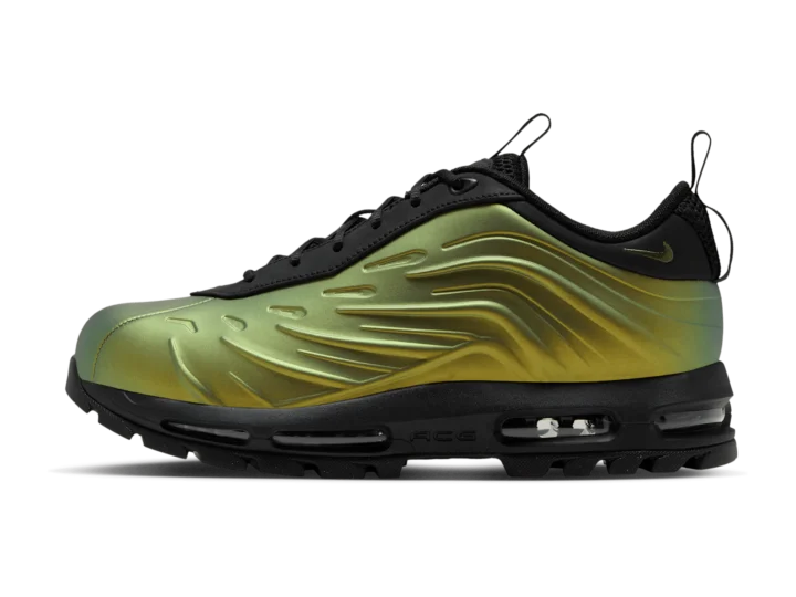 Nike Goadome Low Foam Metallic Gold, lateral side, gold Foamposite-style shell over a black leather upper on a black lugged sole