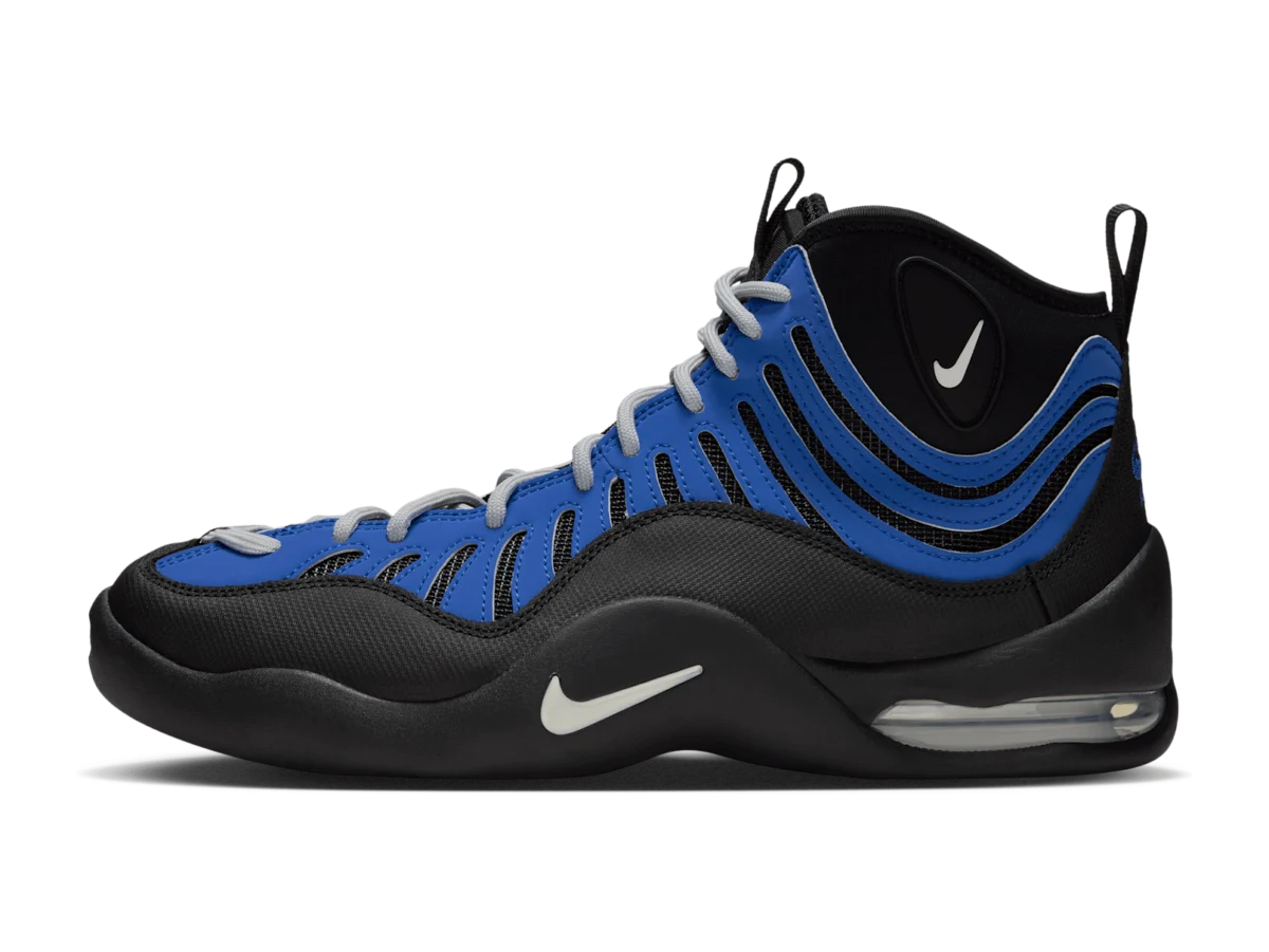 Nike Air Bakin High SP Varsity Royal, lateral side, wavy royal-blue overlays on a black upper, grey laces, white Swoosh on the midsole