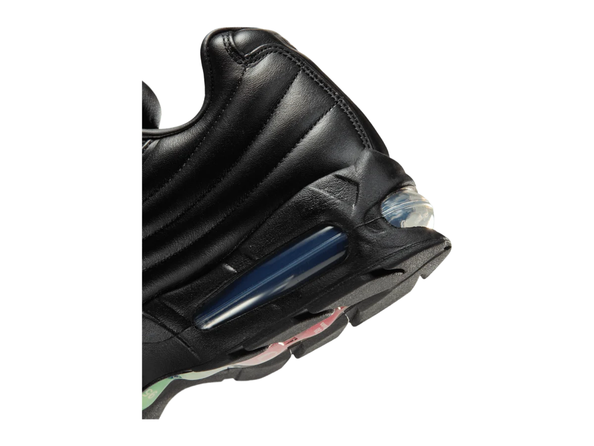 Close-up of the One Block Down Air Max 95 heel, rippled black leather over the blue-tinted Air unit