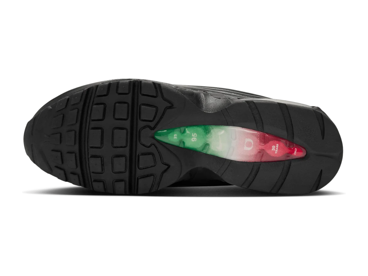 Black outsole of the One Block Down Air Max 95 with a green, white and red window